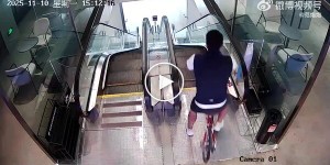 A Chinese man attempts to ride a bicycle Escalator
